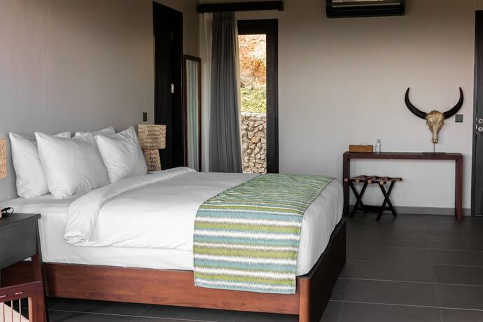 Imagen de la habitación del Hotel Menjaga Bay. Foto 13