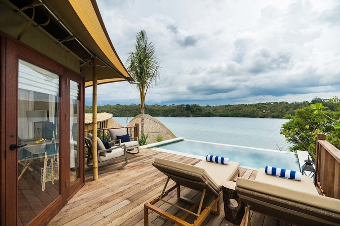 Imagen de la habitación del Hotel Menjangan Dynasty Resort. Foto 16