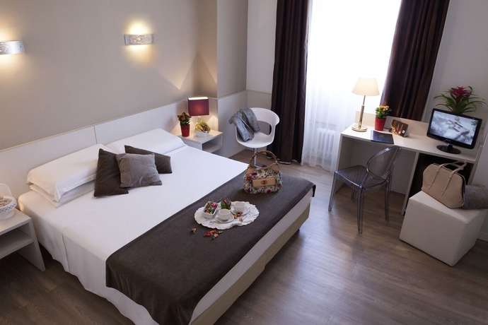 Imagen de la habitación del Hotel Mennini. Foto 5