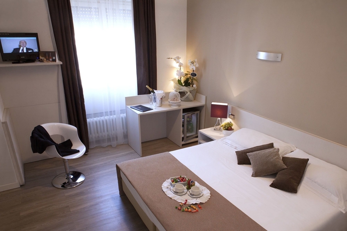 Imagen de la habitación del Hotel Mennini. Foto 7