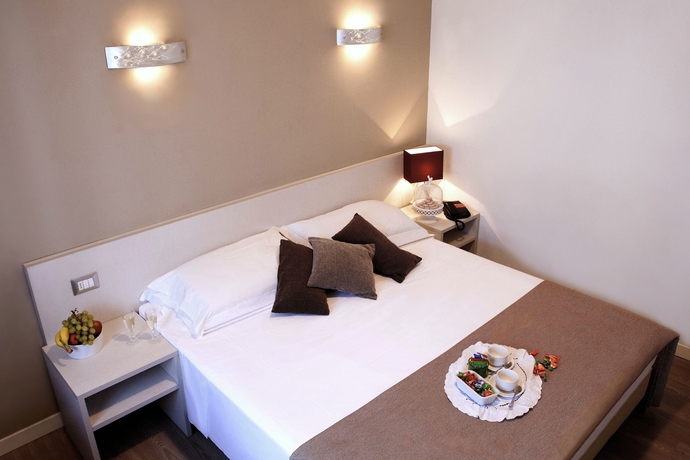 Imagen de la habitación del Hotel Mennini. Foto 13