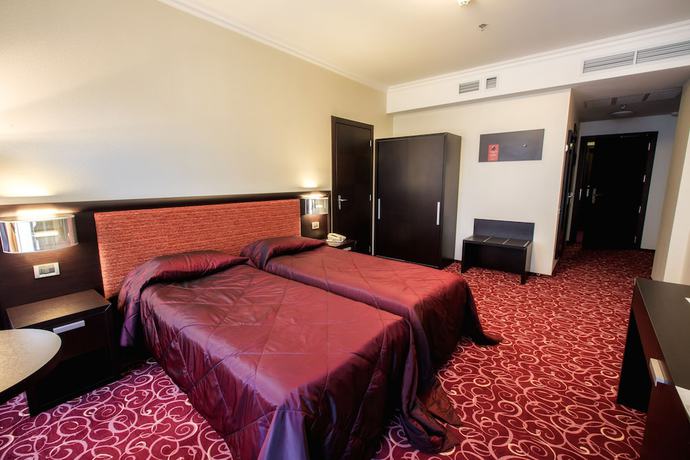 Imagen de la habitación del Hotel Menorah. Foto 17