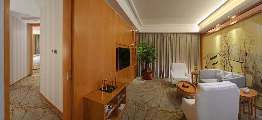 Imagen de la habitación del Hotel Menshine Gloria Plaza Shantou. Foto 9