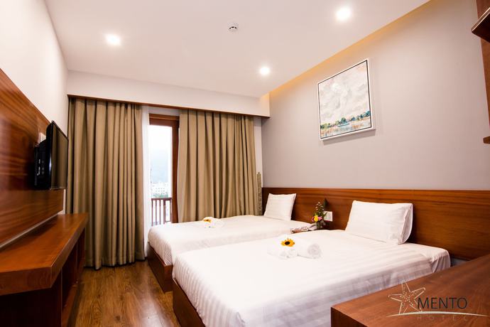 Imagen de la habitación del Hotel Mento. Foto 18