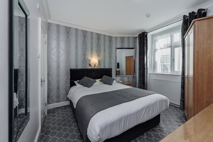 Imagen de la habitación del Hotel Mentone. Foto 9