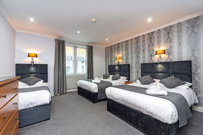 Imagen de la habitación del Hotel Mentone. Foto 12