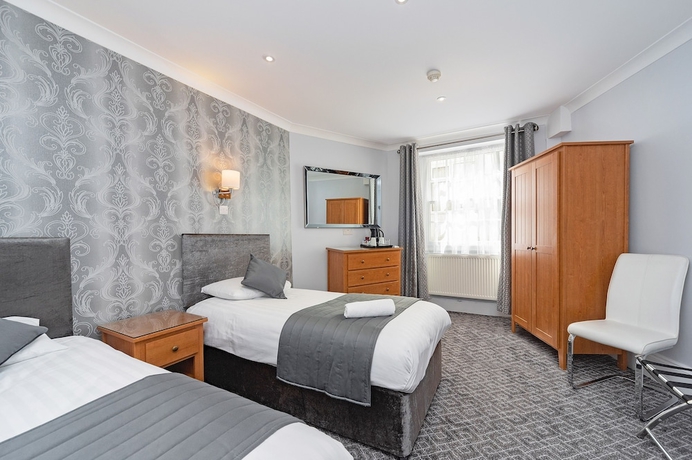 Imagen de la habitación del Hotel Mentone. Foto 15