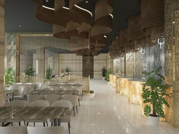 Imagen del bar/restaurante del Hotel Meotel Kebumen managed by DAFAM. Foto 24