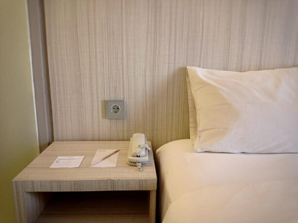 Imagen de la habitación del Hotel Meotel Kebumen managed by DAFAM. Foto 32