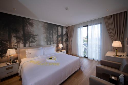 Imagen de la habitación del Hotel MerPerle Dalat. Foto 12