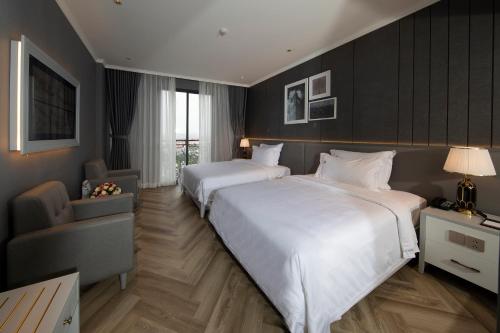 Imagen de la habitación del Hotel MerPerle Dalat. Foto 14