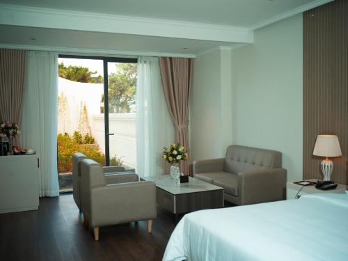 Imagen de la habitación del Hotel MerPerle Dalat. Foto 15