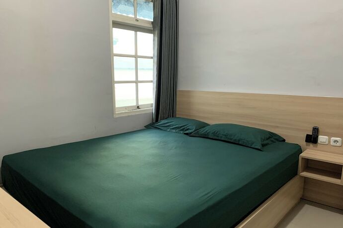 Imagen de la habitación del Hotel Merak Indah. Foto 19