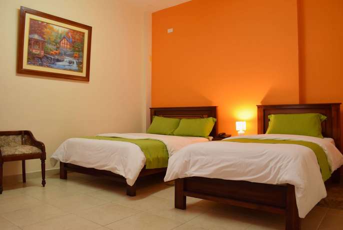 Imagen de la habitación del Hotel Meraki, Ba&ntilde;os de Agua Santa. Foto 9