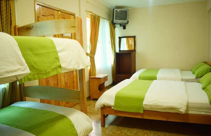 Imagen de la habitación del Hotel Meraki, Ba&ntilde;os de Agua Santa. Foto 18