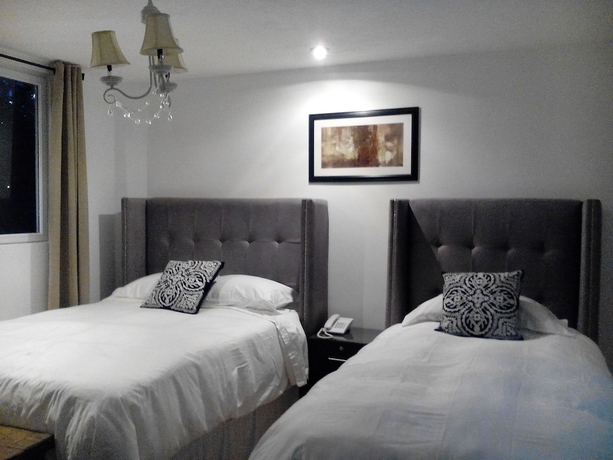 Imagen de la habitación del Hotel Meraki Boutique. Foto 10