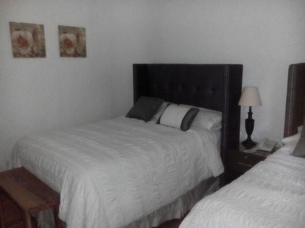 Imagen de la habitación del Hotel Meraki Boutique. Foto 12