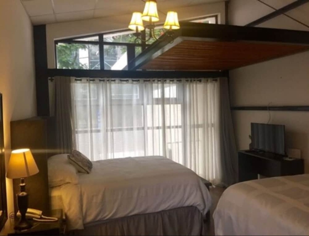 Imagen de la habitación del Hotel Meraki Boutique. Foto 18