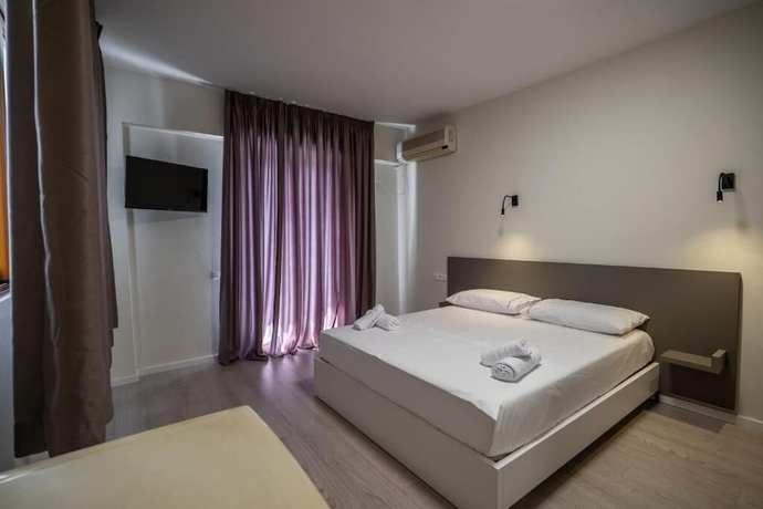 Imagen de la habitación del Hotel Meraki Rooms. Foto 7
