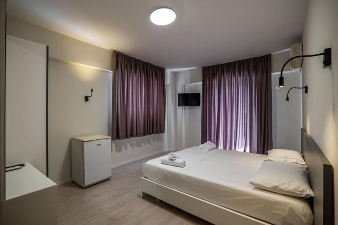 Imagen de la habitación del Hotel Meraki Rooms. Foto 16