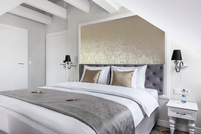 Imagen de la habitación del Hotel Merci Boutique. Foto 3