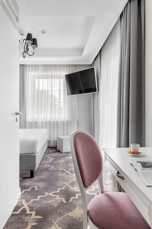 Imagen de la habitación del Hotel Merci Boutique. Foto 4