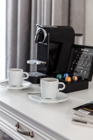 Imagen de la habitación del Hotel Merci Boutique. Foto 12