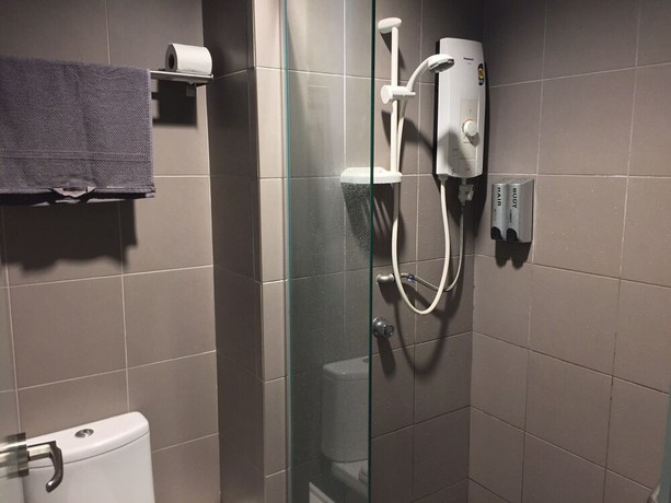 Imagen de la habitación del Hotel Mercu Summer Suites Freluxe Homestay. Foto 5