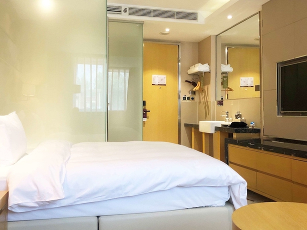 Imagen de la habitación del Hotel Mercure Beijing Chang An West. Foto 11