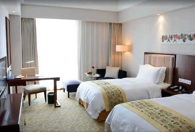 Imagen de la habitación del Hotel Mercure Beijing Downtown. Foto 11