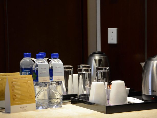 Imagen de la habitación del Hotel Mercure Beijing Downtown. Foto 12