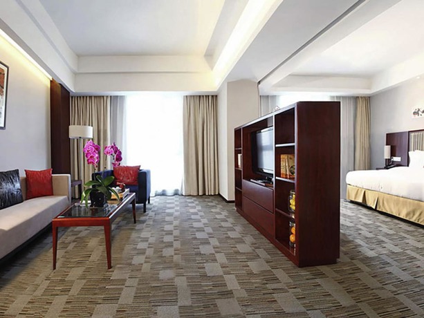 Imagen de la habitación del Hotel Mercure Beijing Downtown. Foto 18
