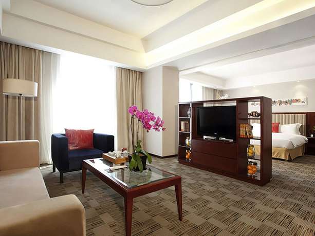 Imagen de la habitación del Hotel Mercure Beijing Downtown. Foto 19