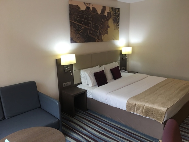 Imagen de la habitación del Hotel Mercure Brussels Centre Midi. Foto 10