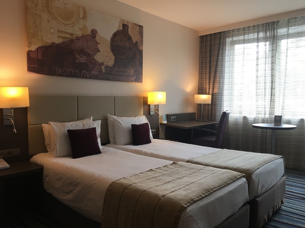 Imagen de la habitación del Hotel Mercure Brussels Centre Midi. Foto 12