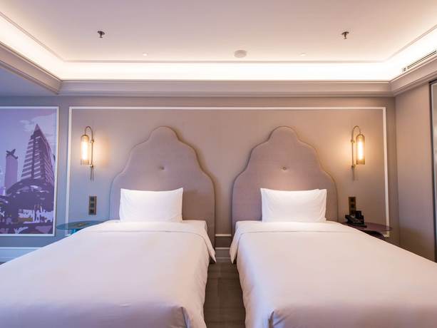 Imagen de la habitación del Hotel Mercure Changchun Hengxing. Foto 9