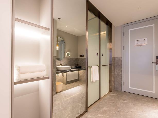 Imagen de la habitación del Hotel Mercure Changchun Hengxing. Foto 13