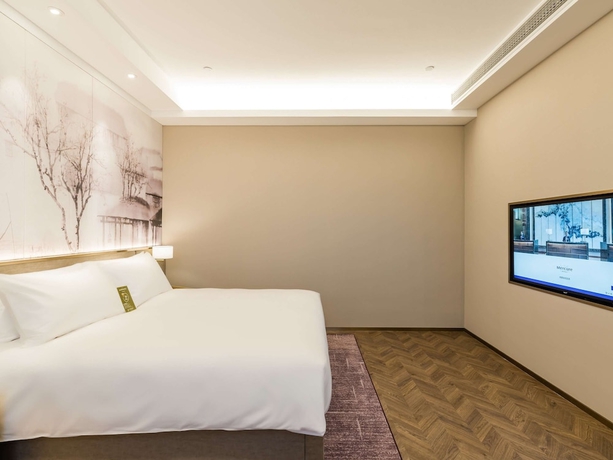 Imagen de la habitación del Hotel Mercure Changzhou Jintan. Foto 13