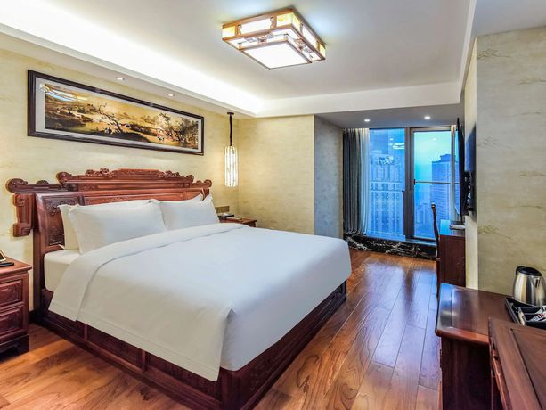 Imagen de la habitación del Hotel Mercure Chongqing Downtown. Foto 2