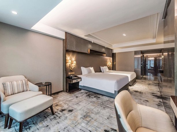 Imagen de la habitación del Hotel Mercure Chongqing Downtown. Foto 11