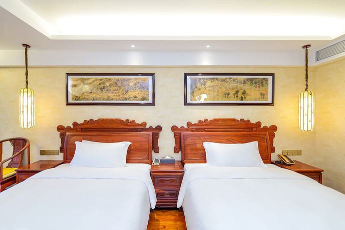 Imagen de la habitación del Hotel Mercure Chongqing Downtown. Foto 19