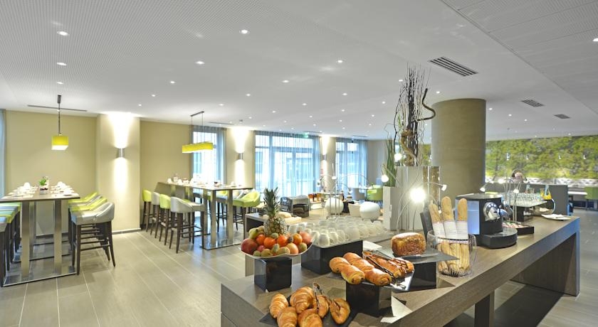 Imagen del bar/restaurante del Hotel Mercure Clermont Ferrand Centre Jaude. Foto 2