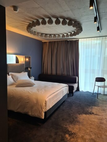Imagen de la habitación del Hotel Mercure Del&eacute;mont. Foto 15