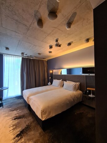 Imagen de la habitación del Hotel Mercure Del&eacute;mont. Foto 16
