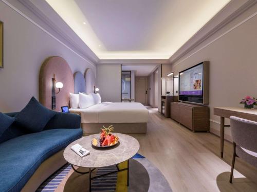 Imagen de la habitación del Hotel Mercure Dongtai Huanghai Forest. Foto 15