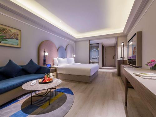 Imagen de la habitación del Hotel Mercure Dongtai Huanghai Forest. Foto 16