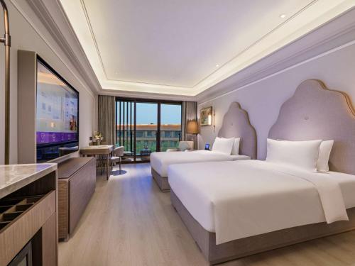 Imagen de la habitación del Hotel Mercure Dongtai Huanghai Forest. Foto 19