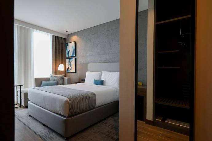 Imagen de la habitación del Hotel Mercure Dubai Gold District. Foto 11
