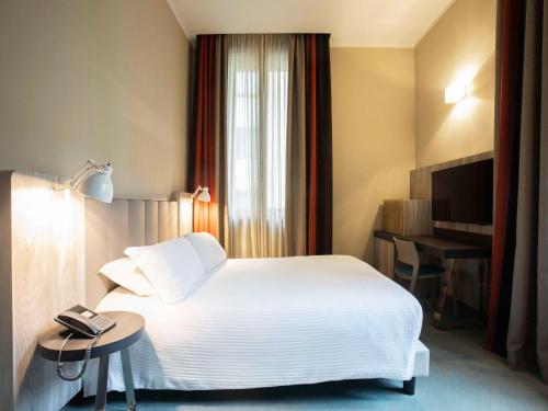 Imagen de la habitación del Hotel Mercure Firenze Centro. Foto 2