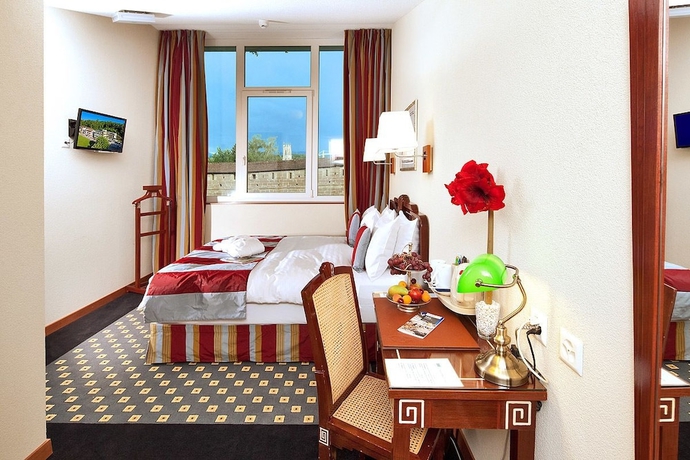 Imagen de la habitación del Hotel Mercure Fribourg Centre Remparts. Foto 10